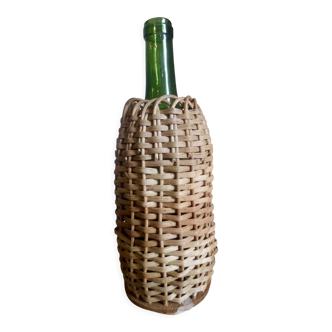 Bottle in a rattan basketry 50s