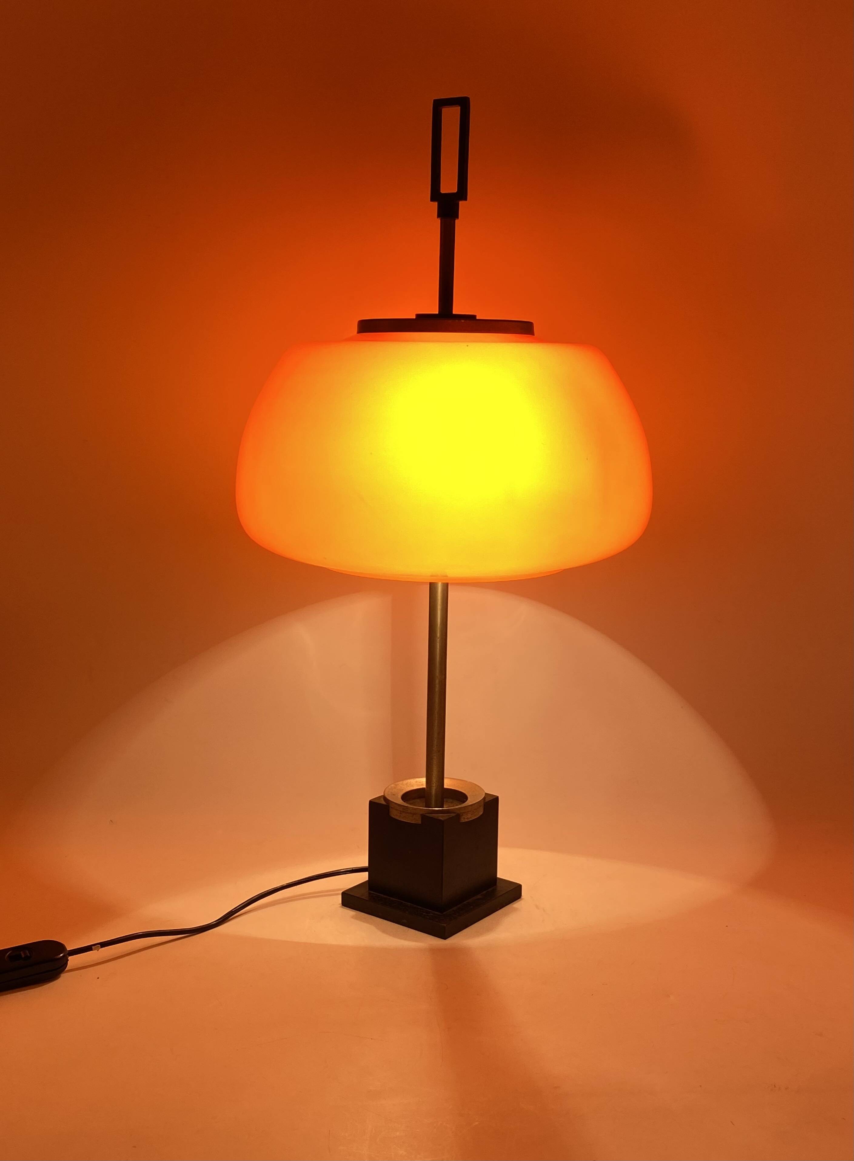 Oscar Torlasco, orange glass table / desk lamp, Prod. Lumi, 1960 ca.