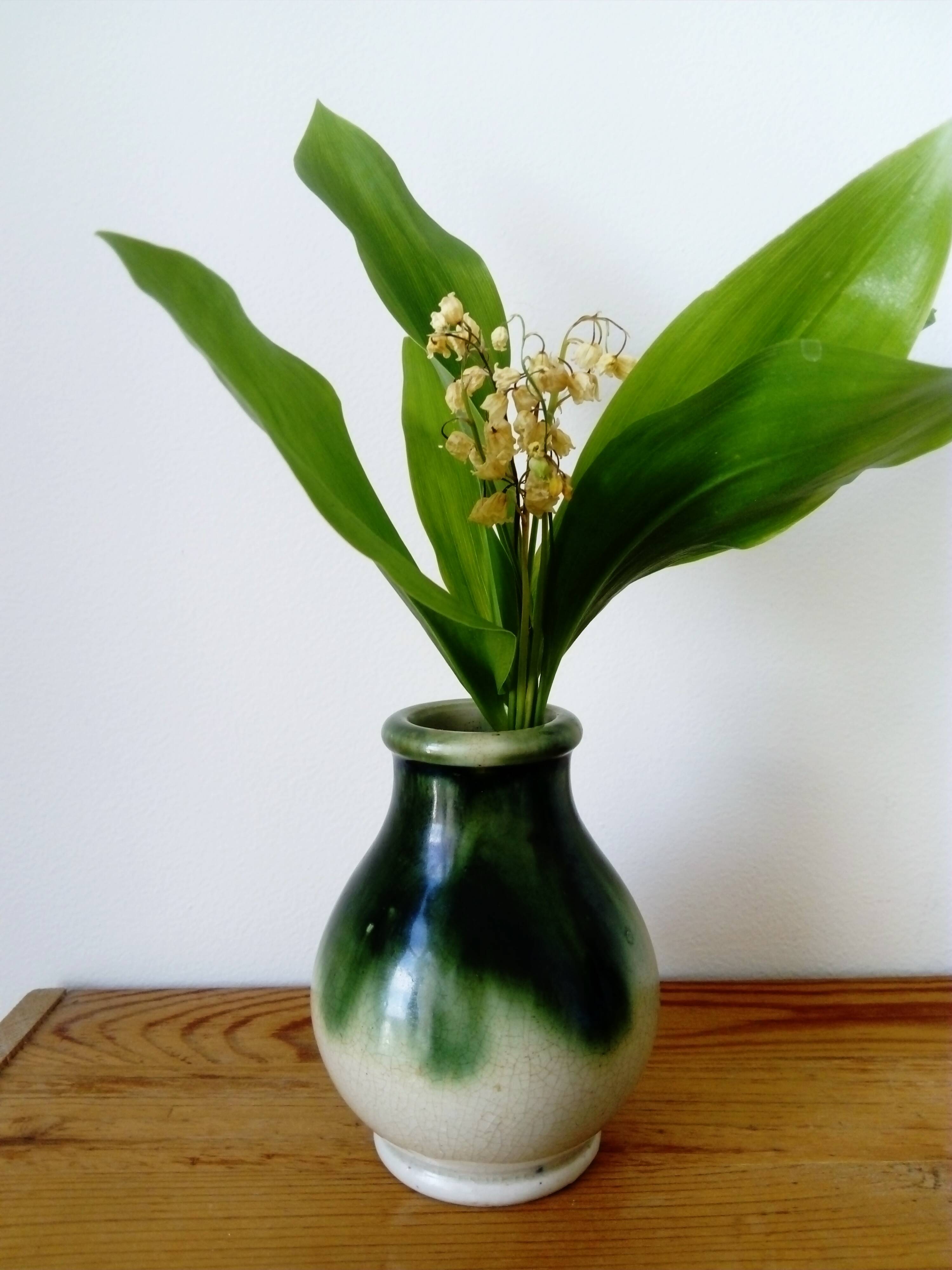 small green and cream glazed ceramic vase