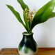 small green and cream glazed ceramic vase