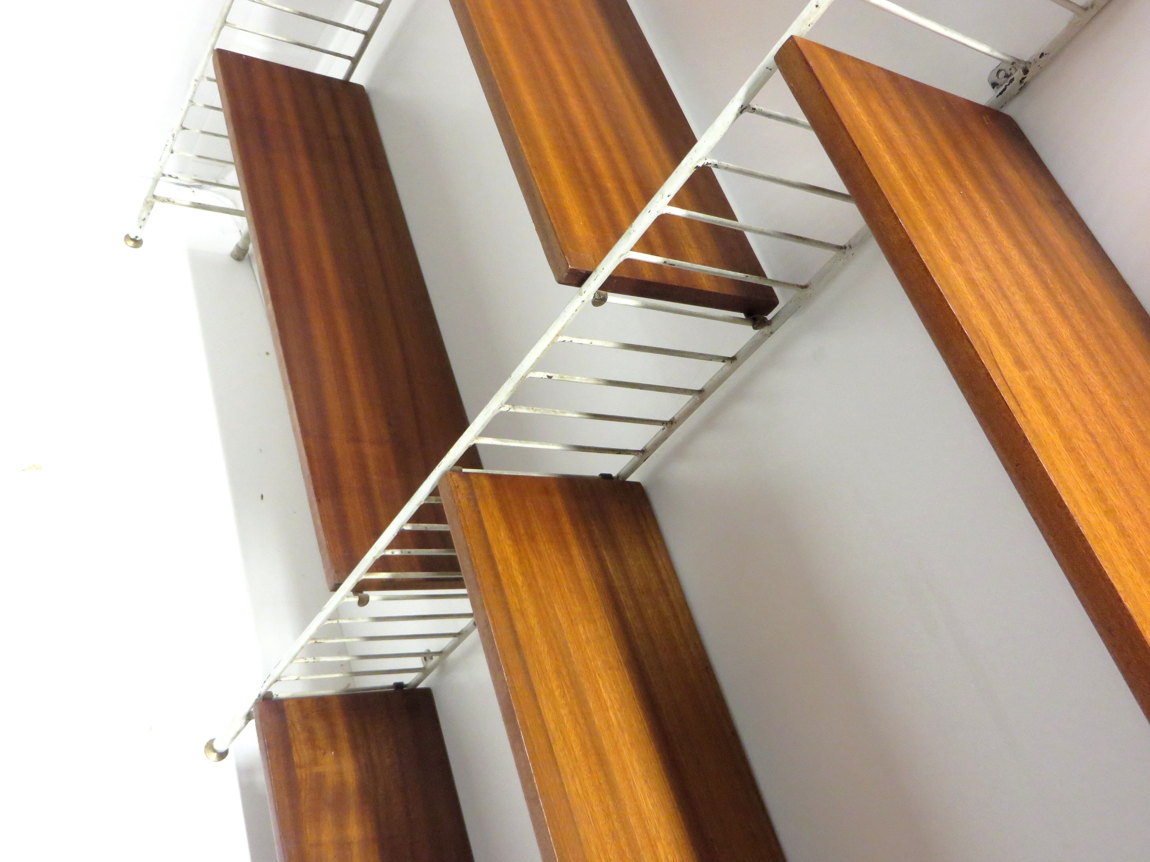 Wall rack with 9 shelves made in the 60