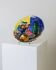 Multicolored hand-painted ceramic wall plate with 1960s Italian fruit motif, signed Stile