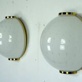 Pair of large round murano bullicante glass sconces with brass. Italy 1970s