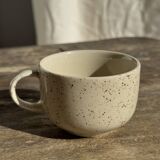 Set of 4 vintage speckled beige stoneware coffee cups.