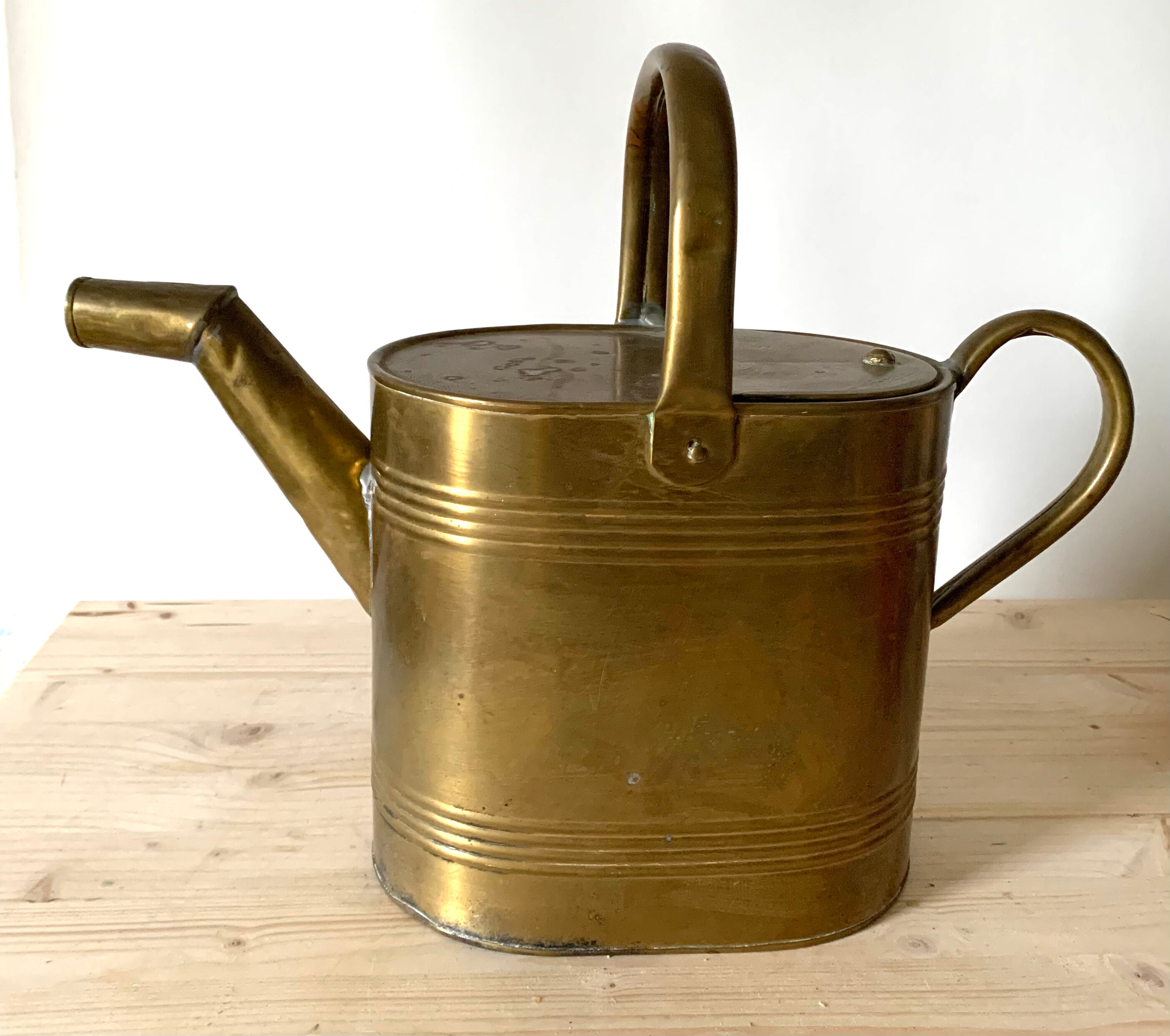 Brass watering can