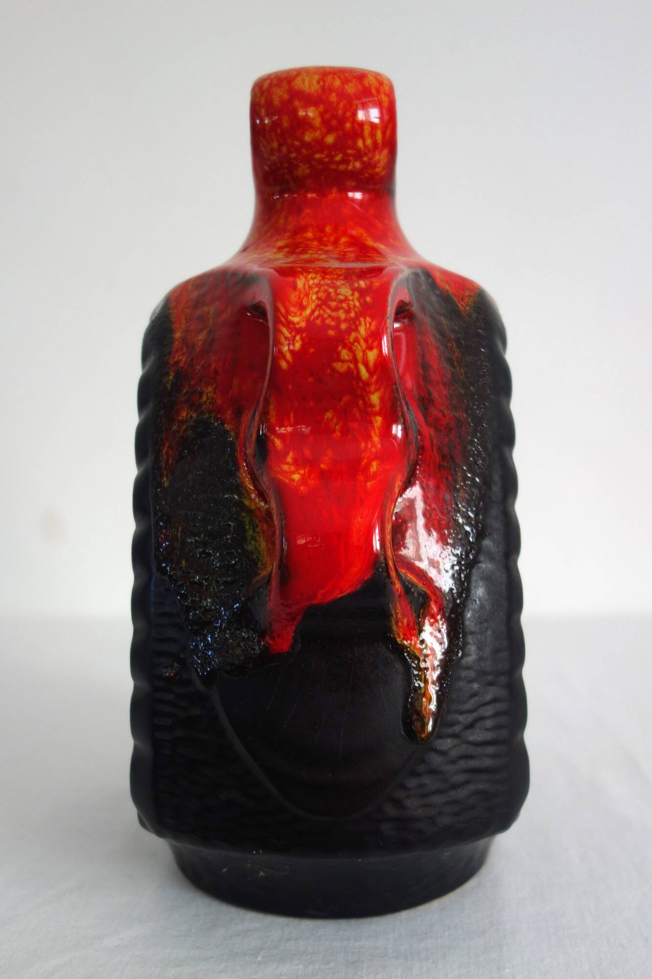 Bay Keramik orange-red and black candle holder from the 70s