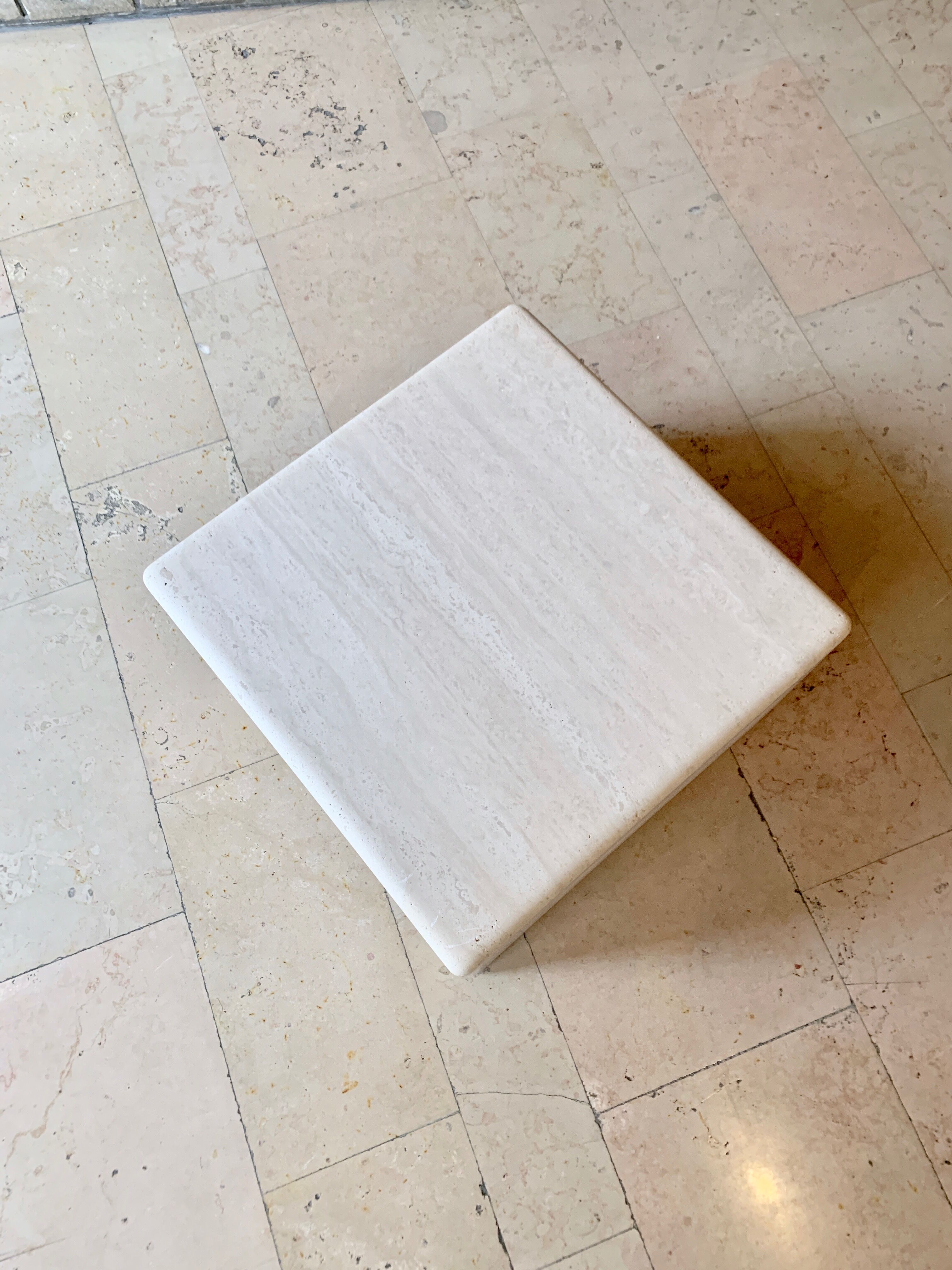 Square coffee table in softened travertine by berraldacci design collection