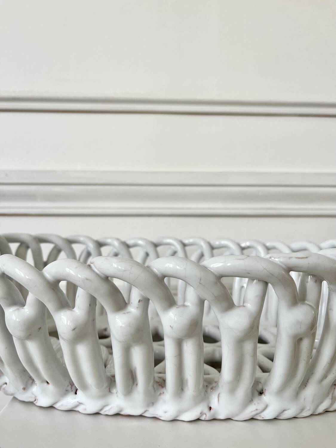 Woven white ceramic fruit bowl