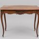 Selling an antique desk.