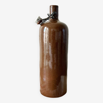 Brown stoneware hot water bottle