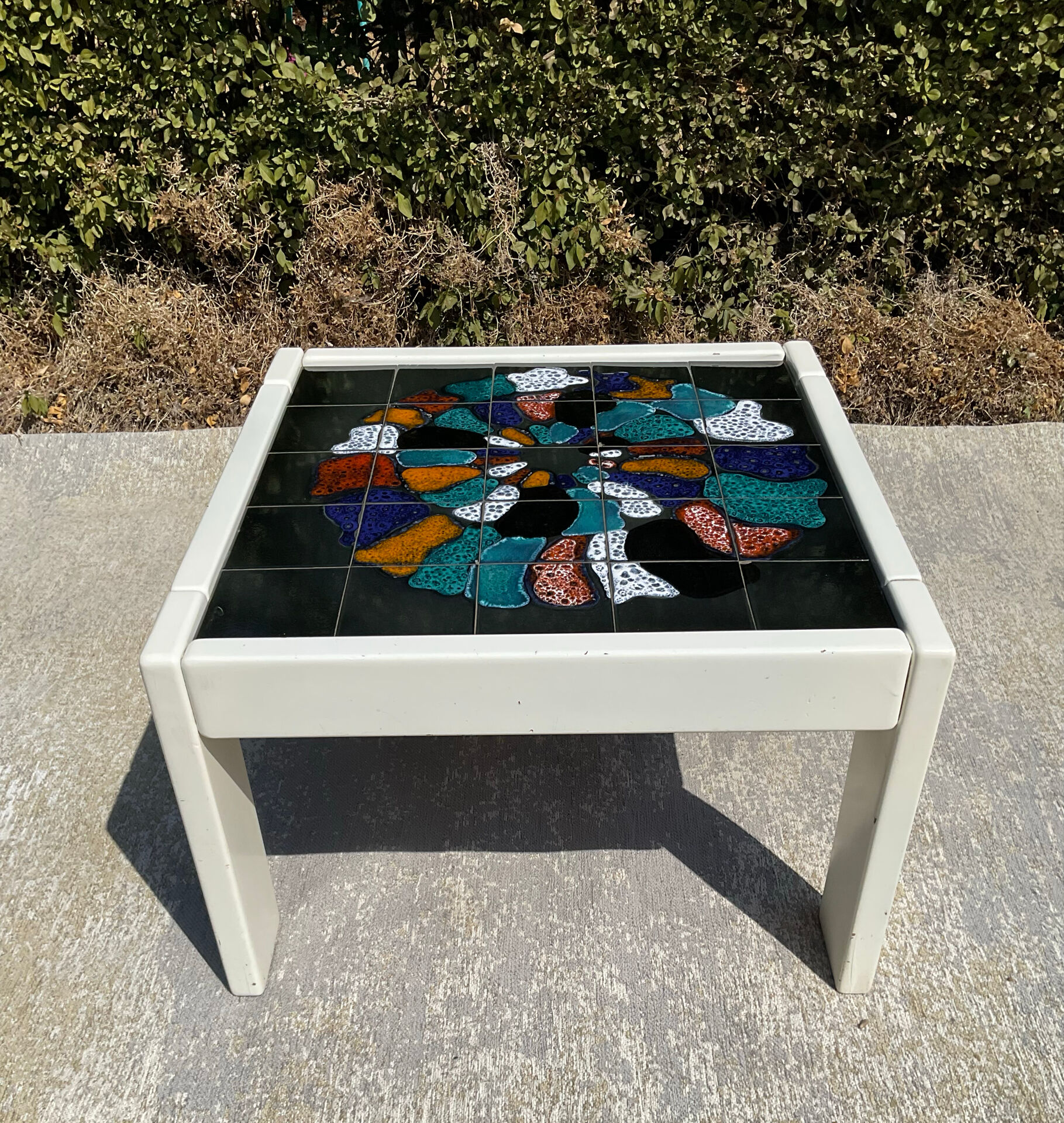 Vintage coffee table in wood and ceramic signed from the 70s-80s.