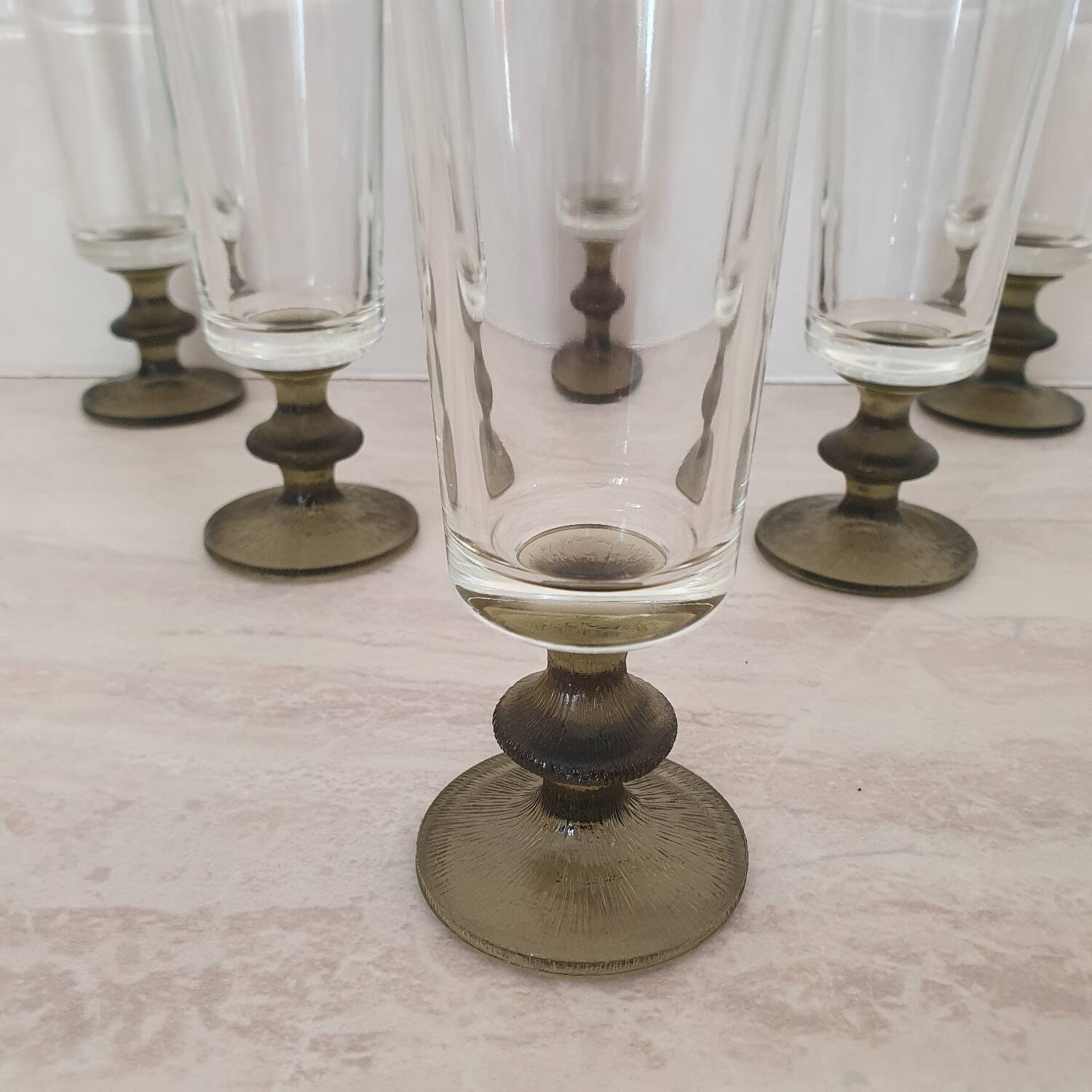 6 small green foot flutes in the Timo Sarpaneva style