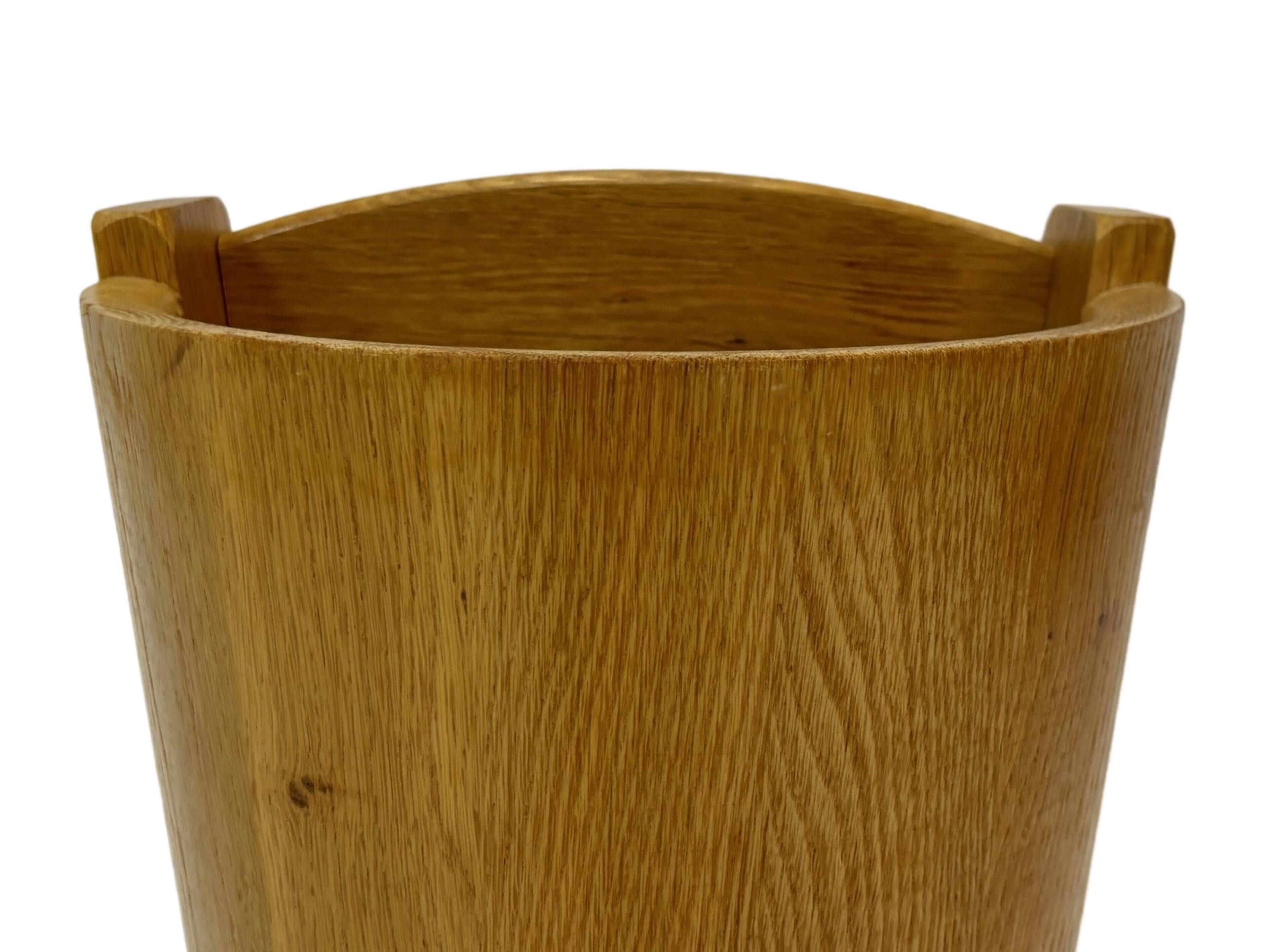 Vintage umbrella holder in oak basket storage design of the 1960s minimalist design