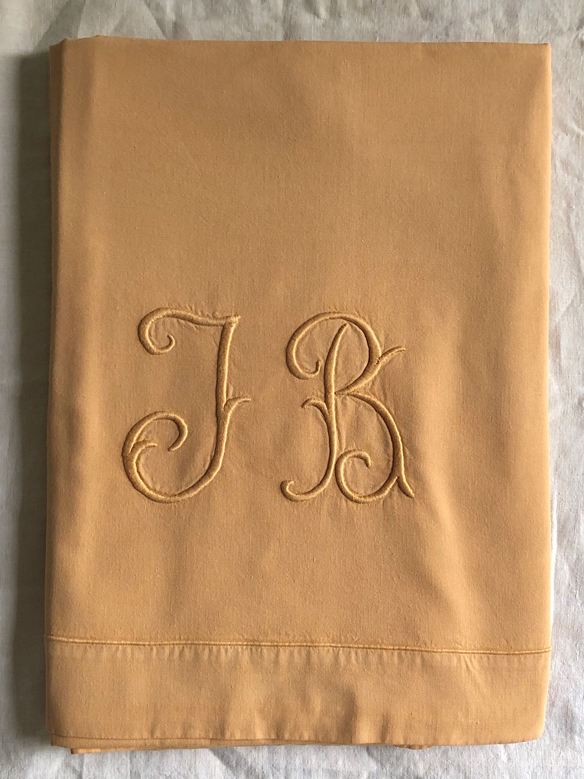 Old linen and yellow cotton sheet