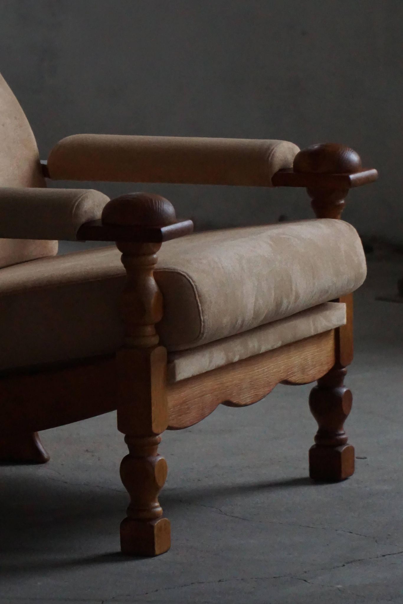 Mid-20th century, pair of armchairs by Henning Kjærnulf, oak and alcantara, 1960s.