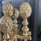 Brass fireplace tools in the style of Maison Baguès.