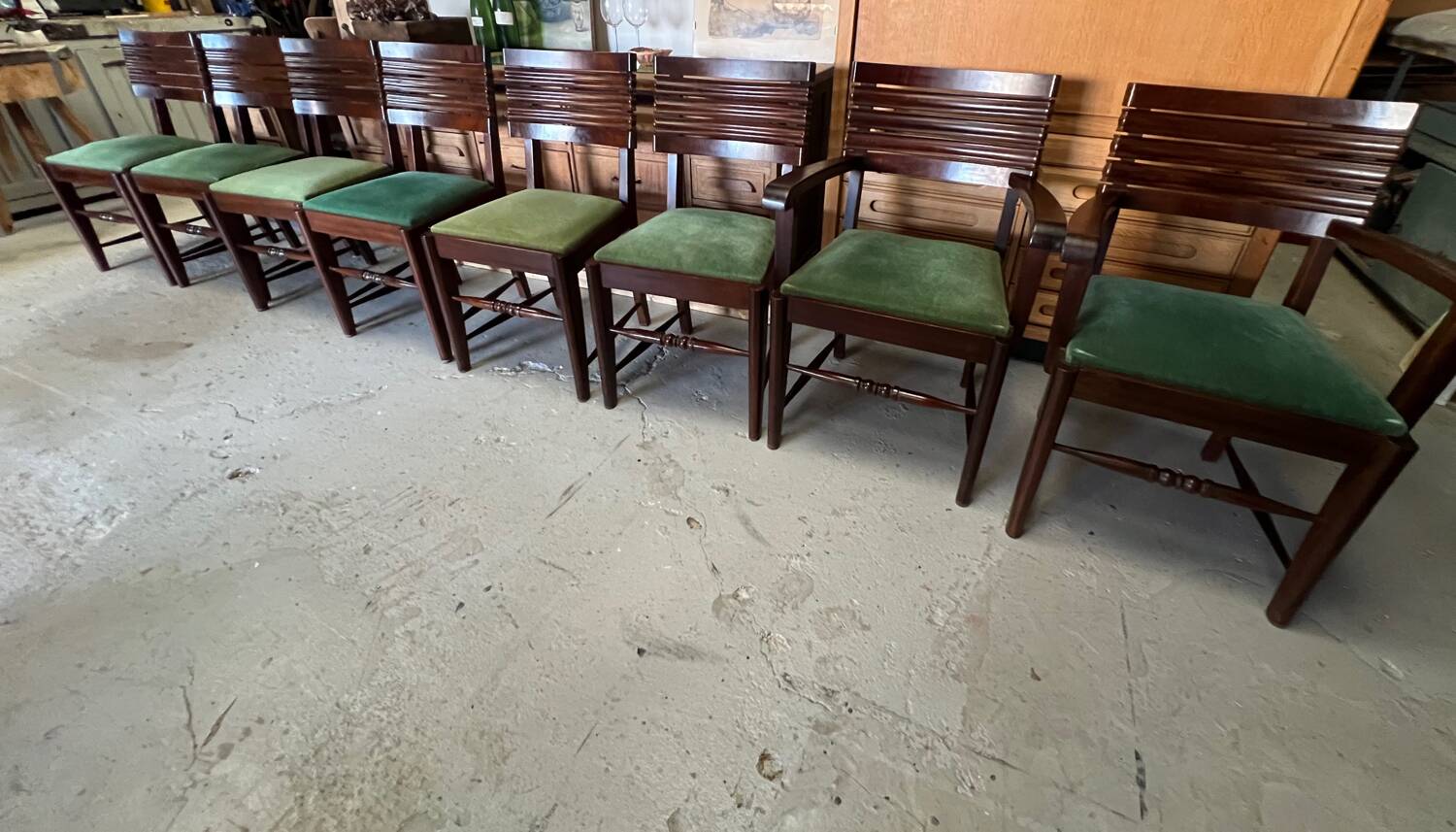 Set of 6 chairs and 2 armchairs by Gaston Poisson