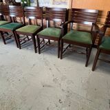 Set of 6 chairs and 2 armchairs by Gaston Poisson