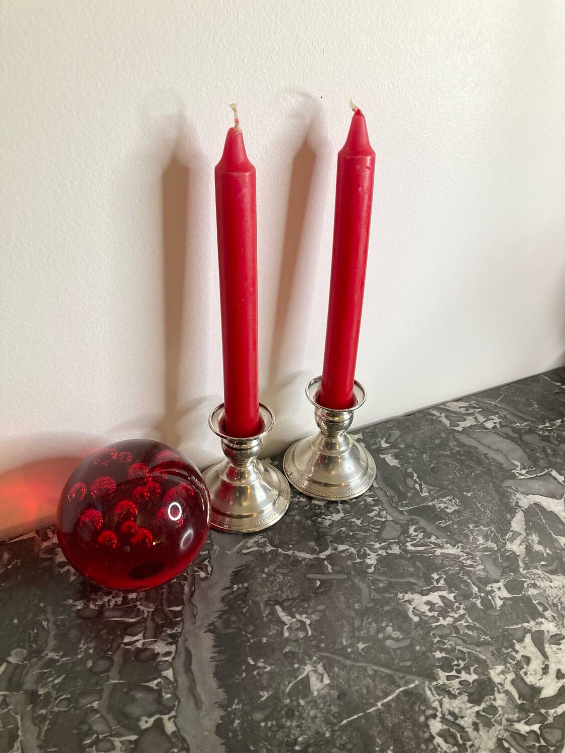 Pair of silver metal candlesticks