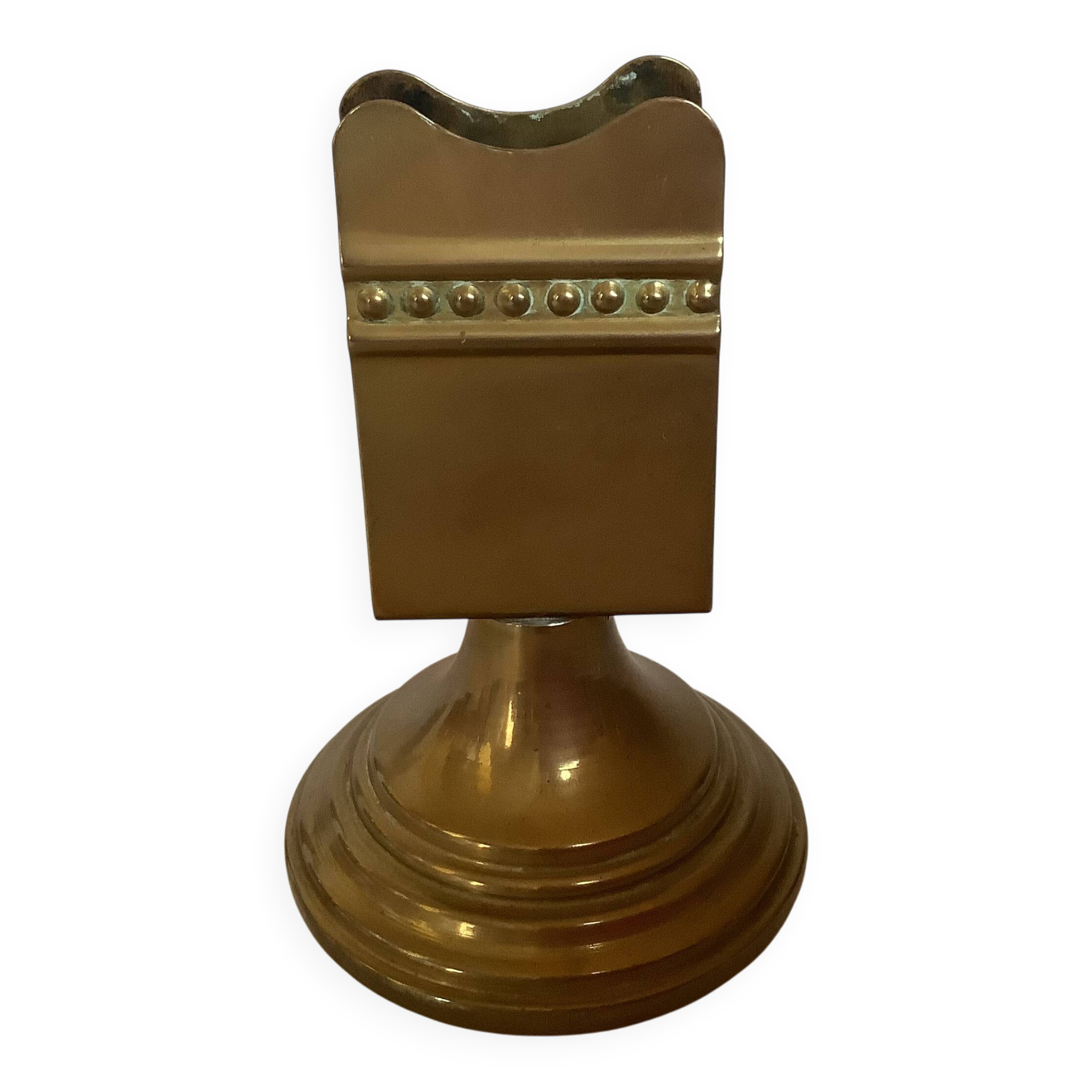 Antique brass match holder with tulip base.