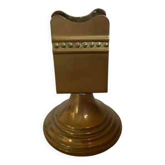 Antique brass match holder with tulip base.