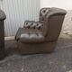 Pair of Chesterfield armchairs with footrest
