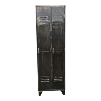 Old metal cloakroom with two panelled doors