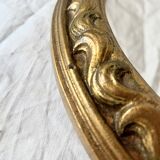 Small vintage wall mirror in gold resin