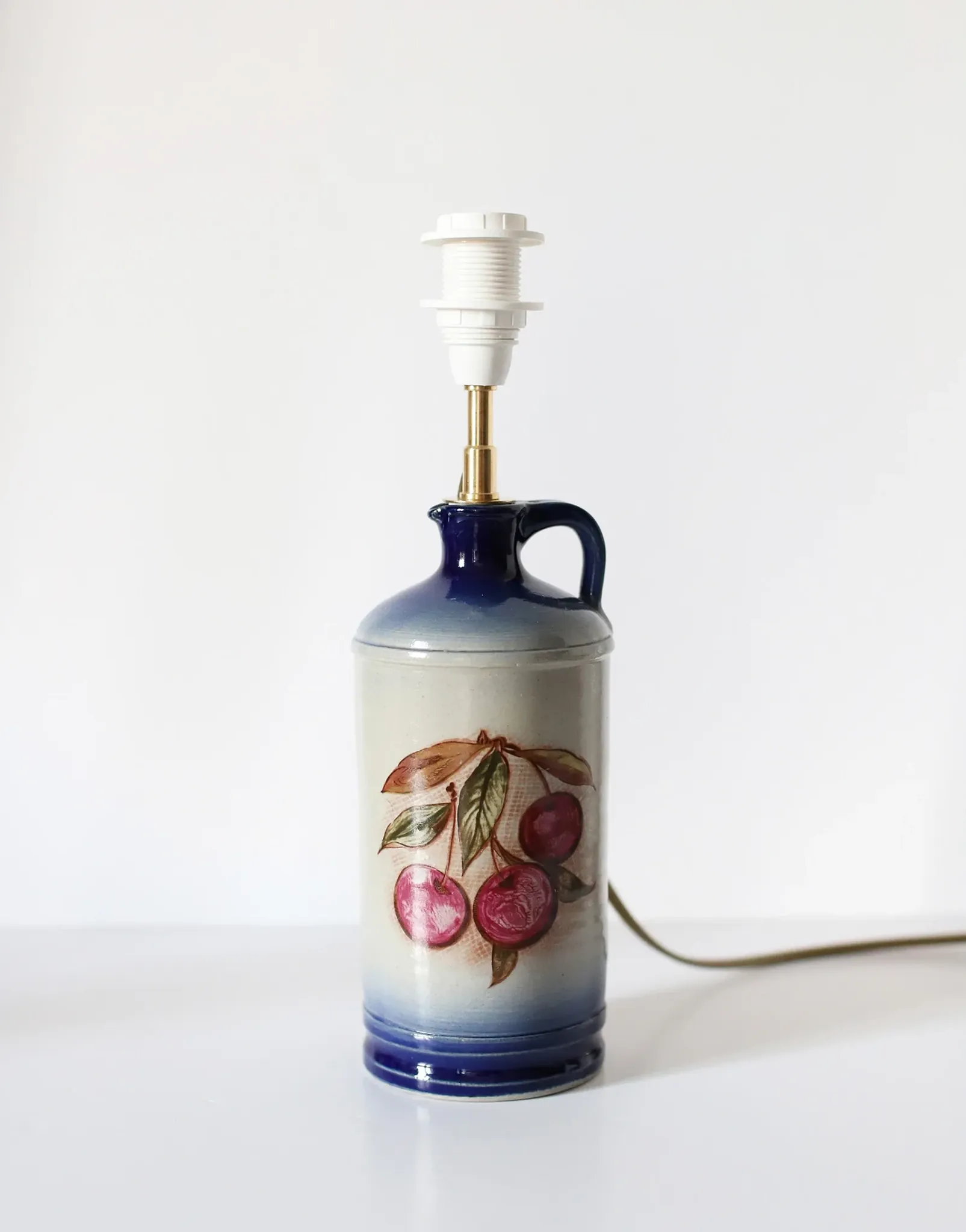 Vintage table lamp Hautlalampe: blue Alsace stone base and pleated Vichy shade.