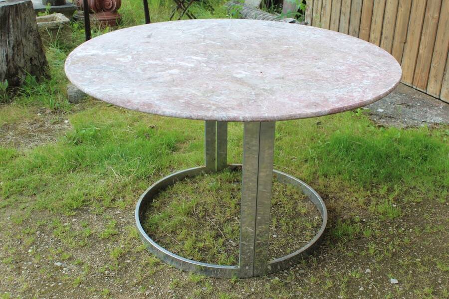 Round marble table with chrome base.