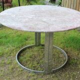 Round marble table with chrome base.