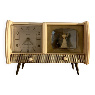 Alarm clock and vintage music box