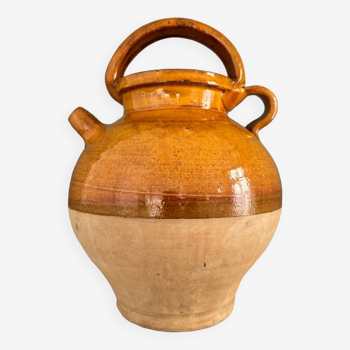 Old terracotta gargoulette jug