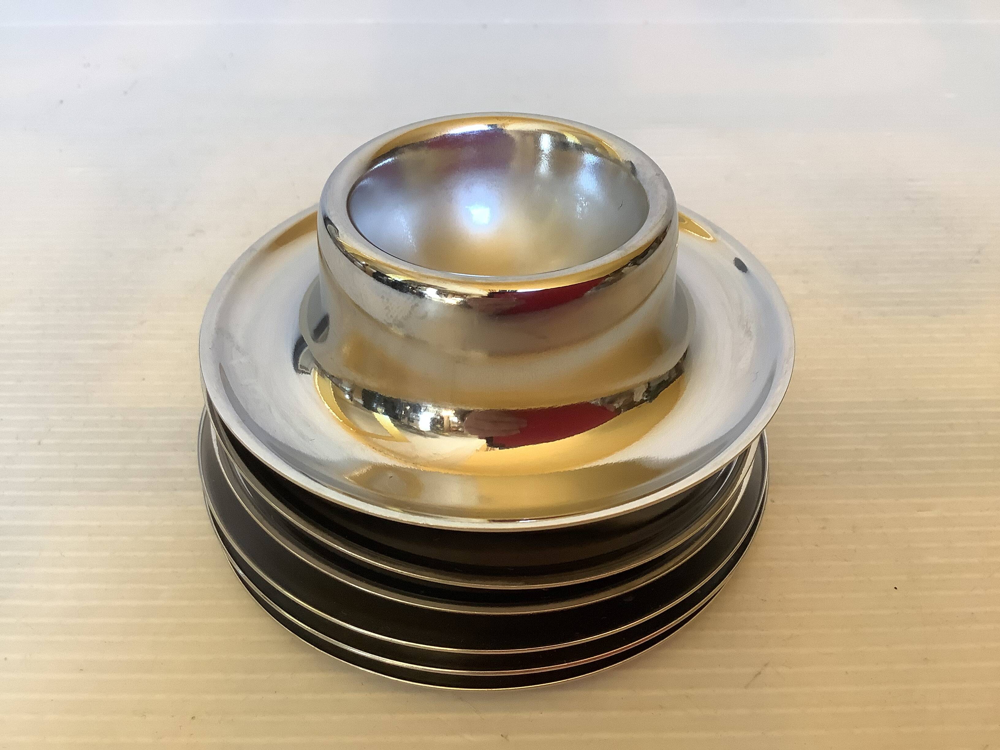 Six metal egg cups