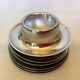 Six metal egg cups