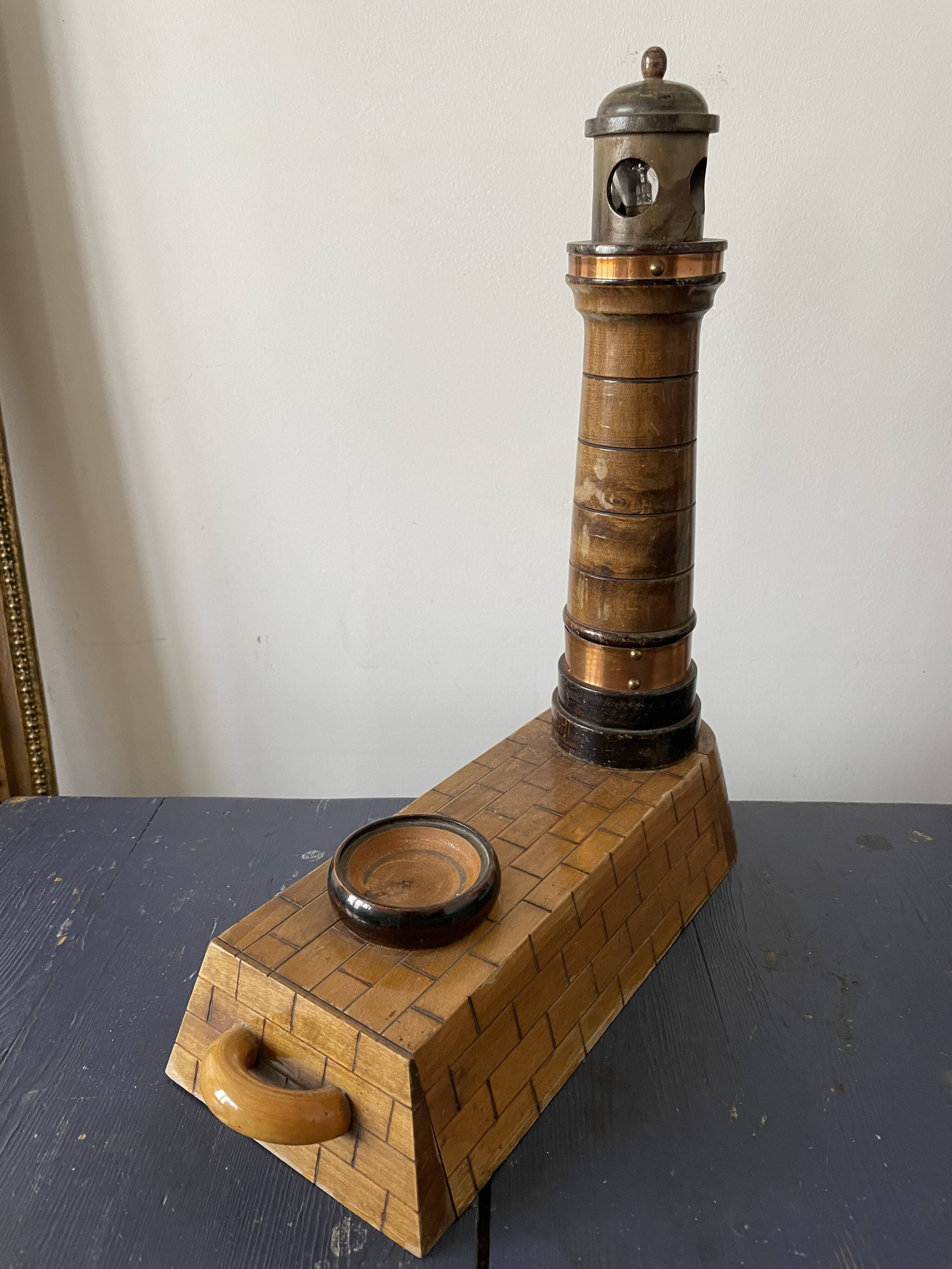 Souvenir lighthouse lamp from Calais in wood
