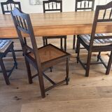 Lot of 4 solid oak chairs with caning in the Henri II style.