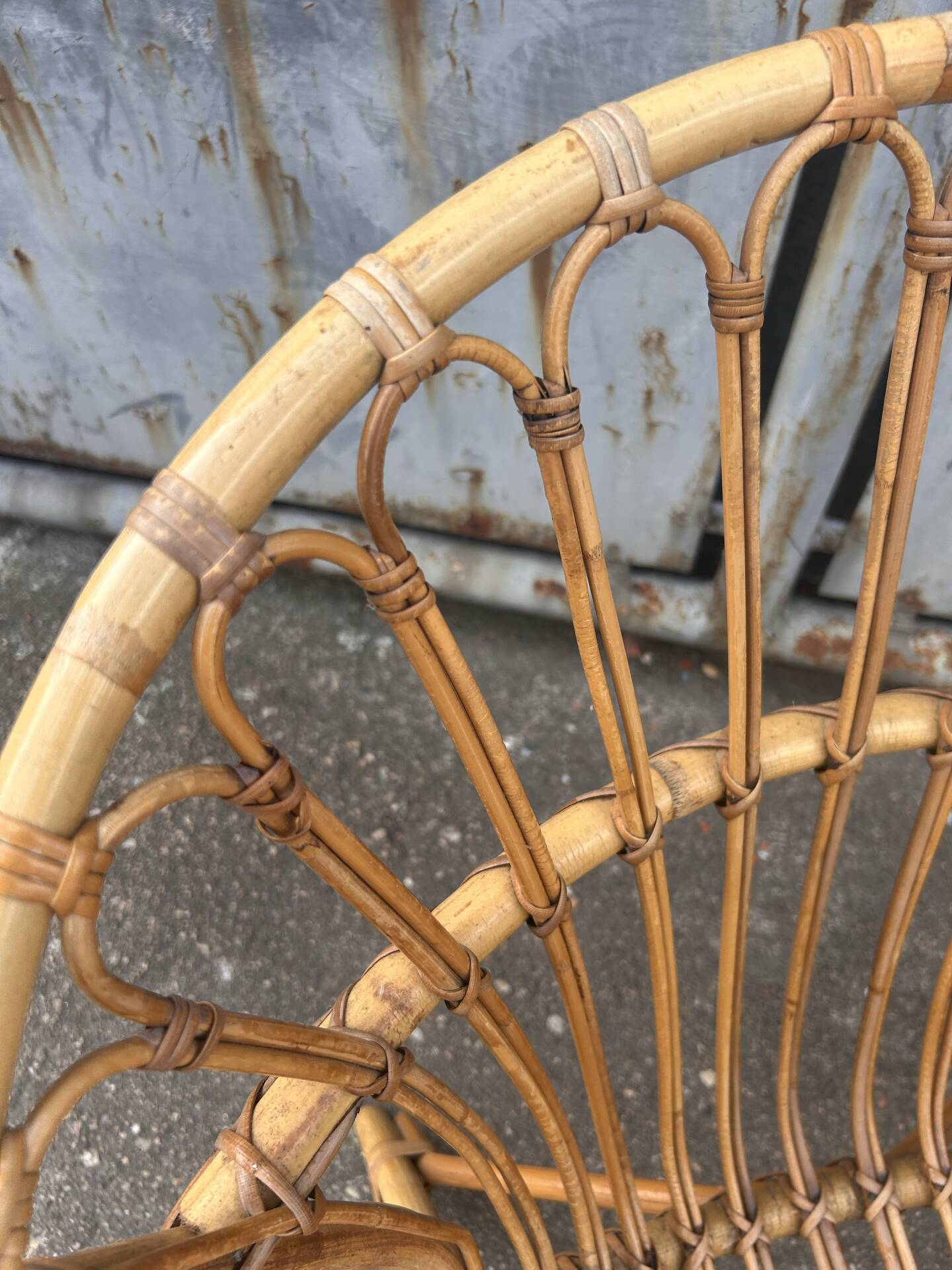 Vintage 1960s rattan shell chair – an icon of bohemian design.