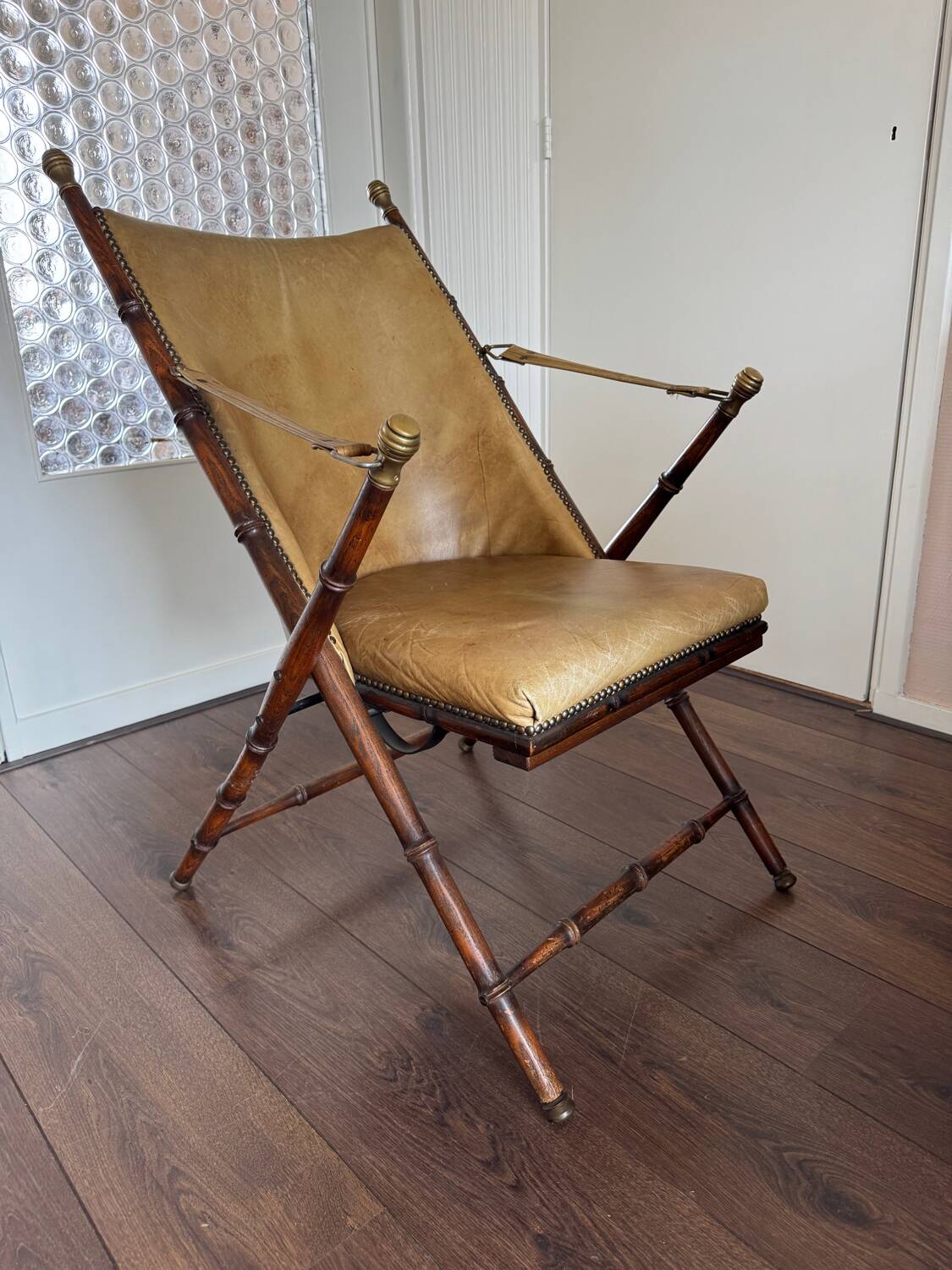 Vintage Faux bamboo, leather campaign folding chair by Maison Jansen, 1950s