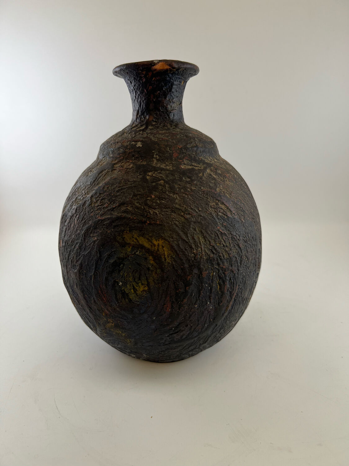 Iridescent black ball vase