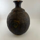 Vase boule noir irisé