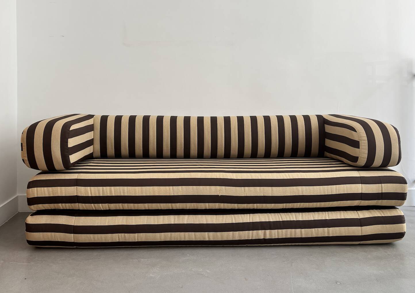 Beige and brown sofa vintage guest bed