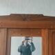 Old art nouveau 3-door wardrobe with mercury mirror
