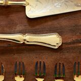 Golden cake cutlery service