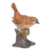 Vintage porcelain bird statuette from the sixties.
