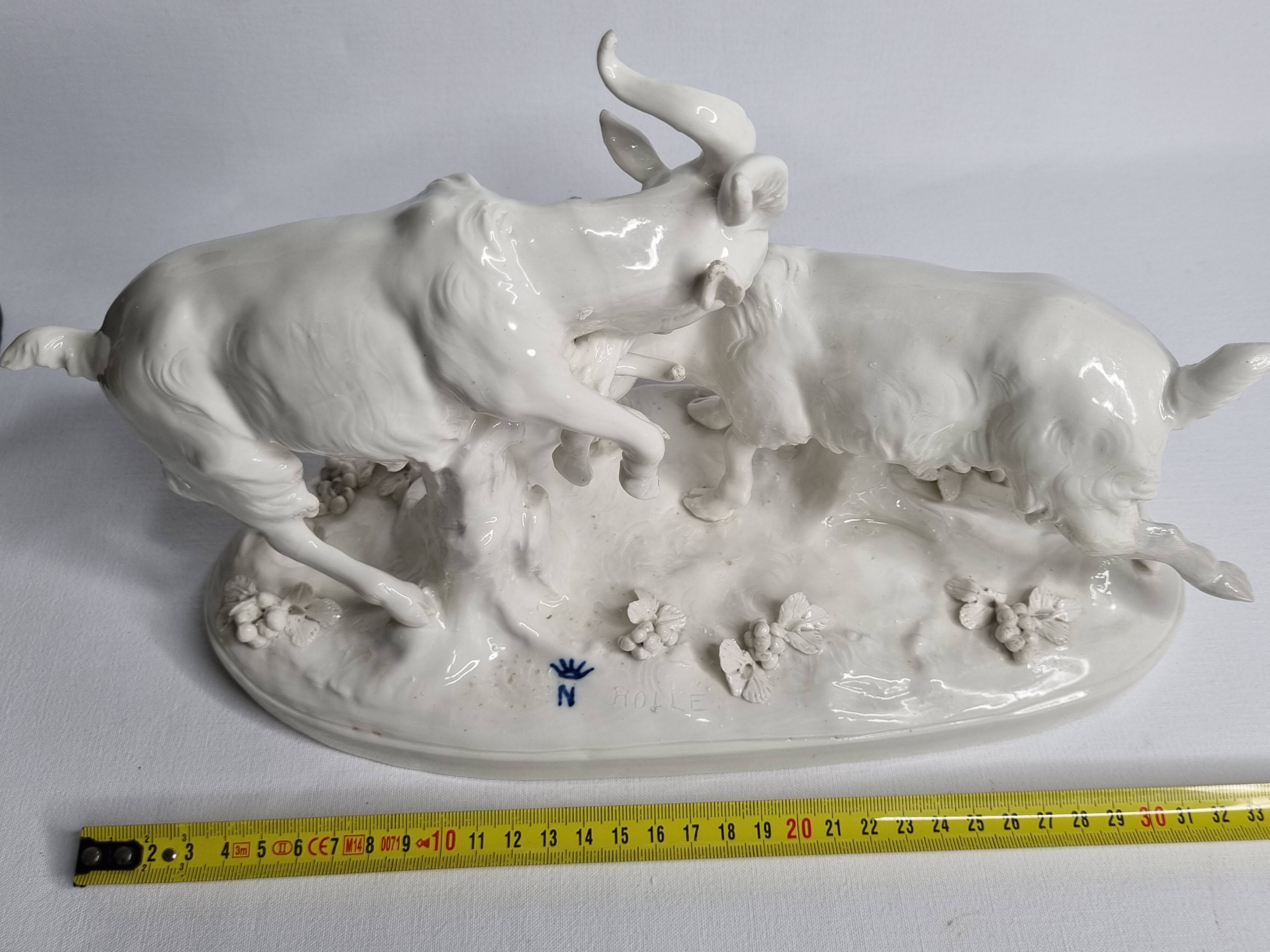 Saxon porcelain group, two fighting goats, signed Röhle, 1900