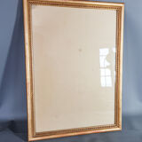Old frame beaded decoration, gilded stucco wood