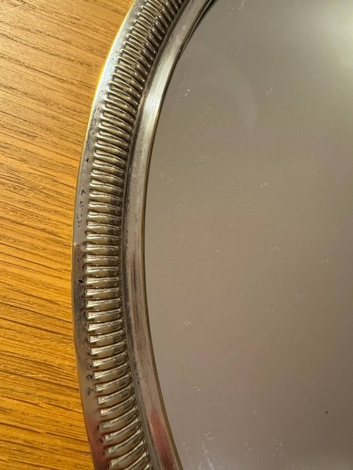 Round silver-plated metal tray and mirror