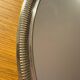 Round silver-plated metal tray and mirror