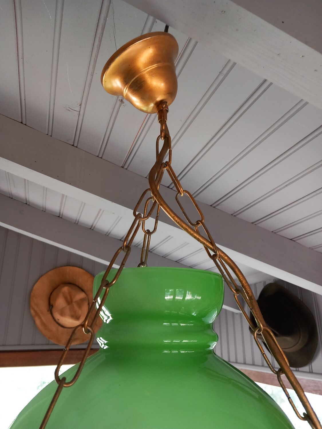 Old green opaline chandelier, gold metal and earthenware